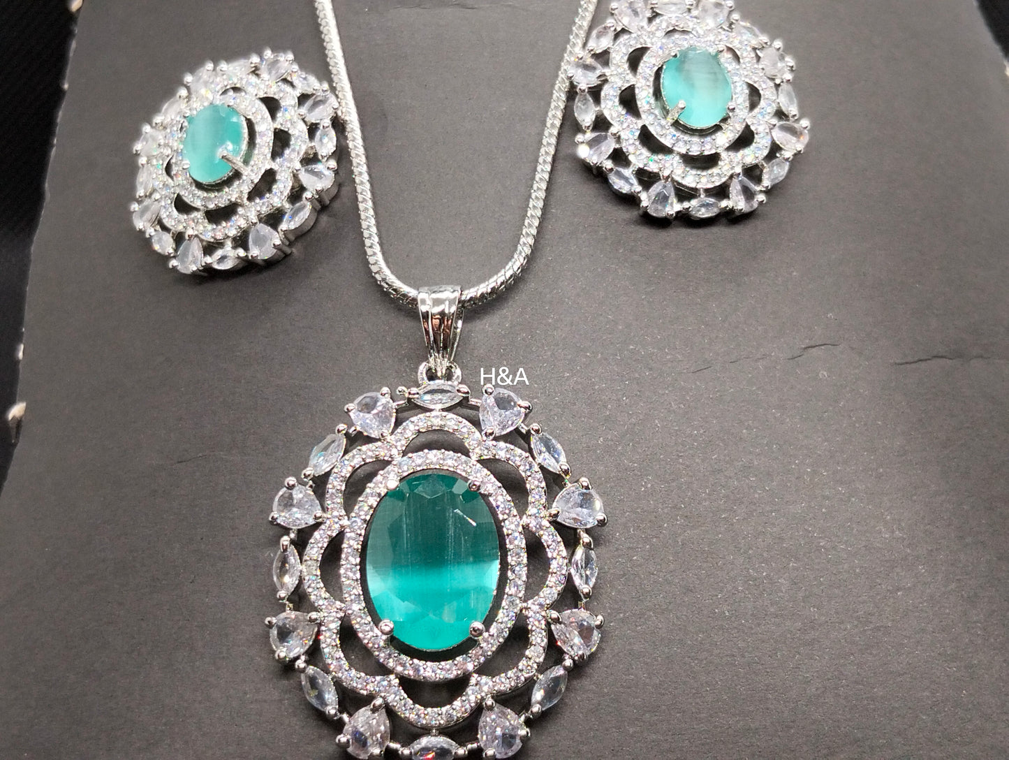 One carat mint green stone pendant set with cubic zircon