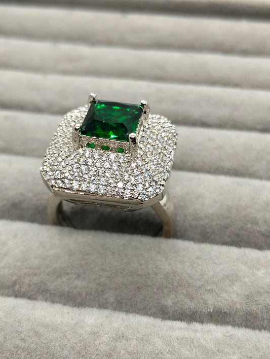 One carat silver rhodium plated ring in green stone