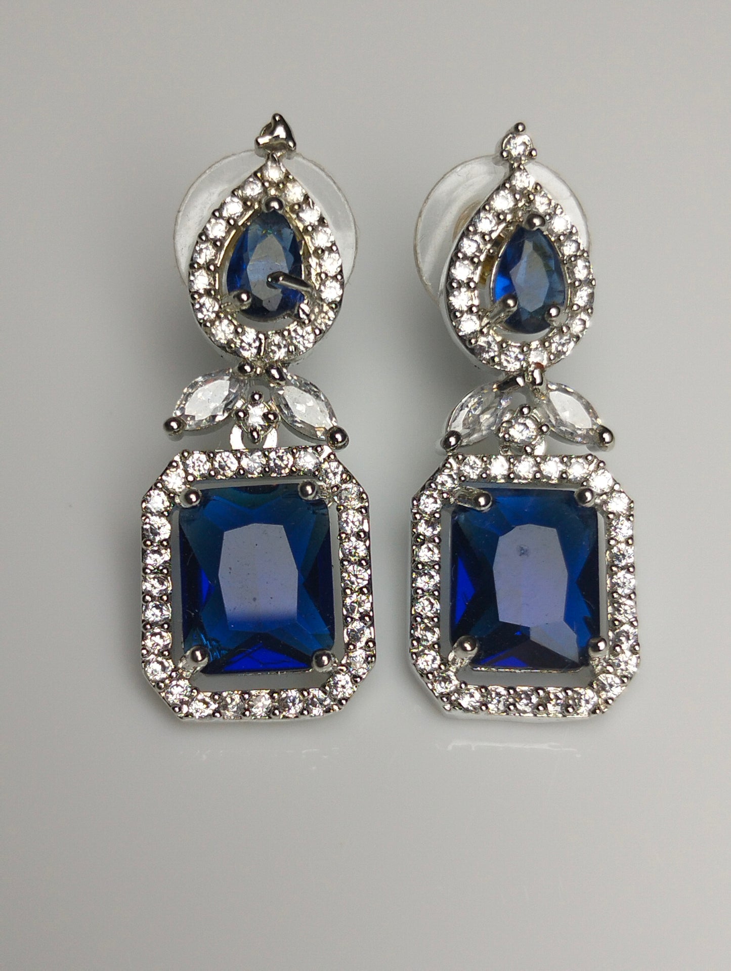 Royal Blue Gemstone Halo Earrings in Rhodium Plated Silver