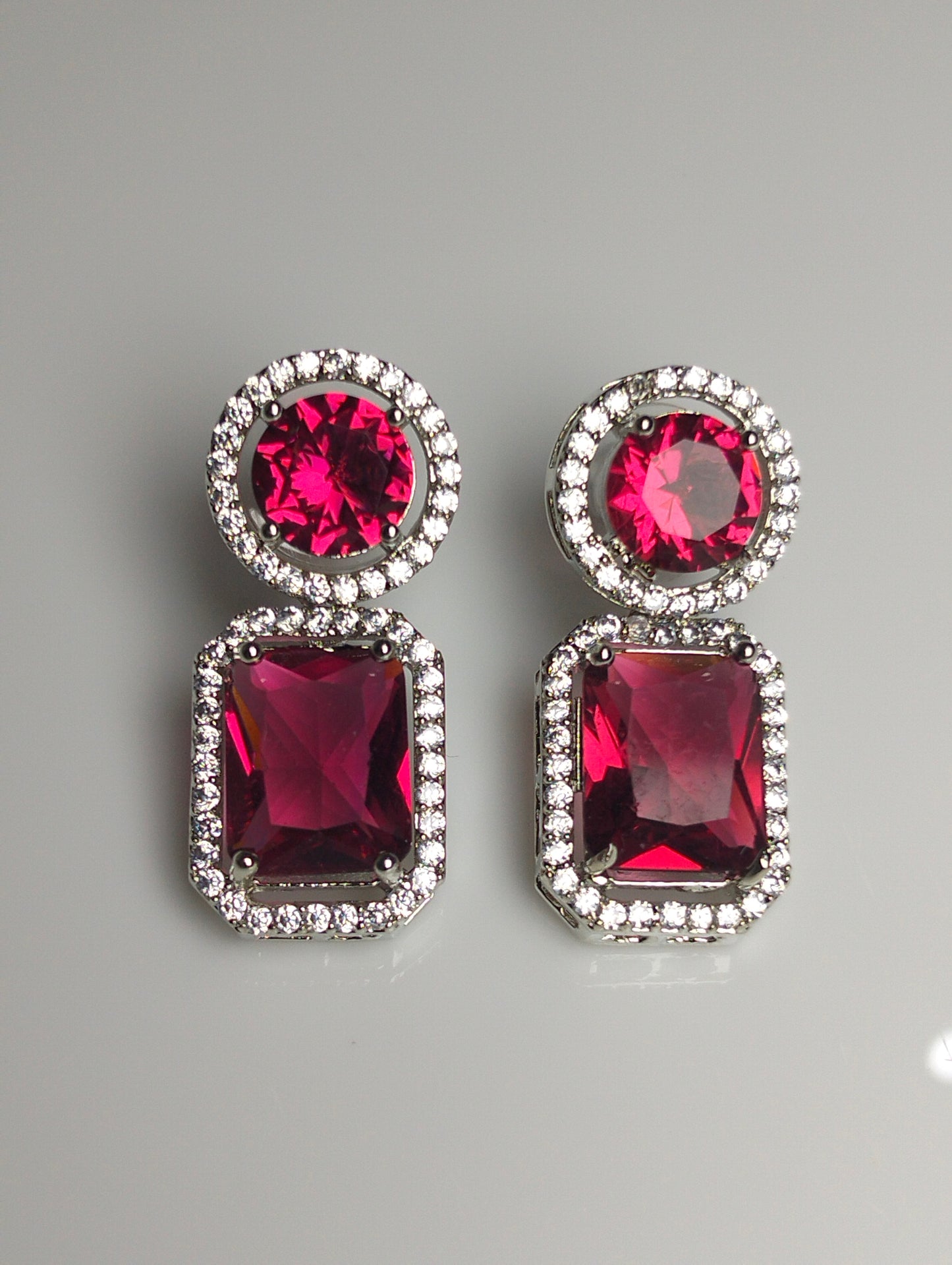 Elegant Red Gemstone & CZ Halo Earrings in Rhodium Plated Silver