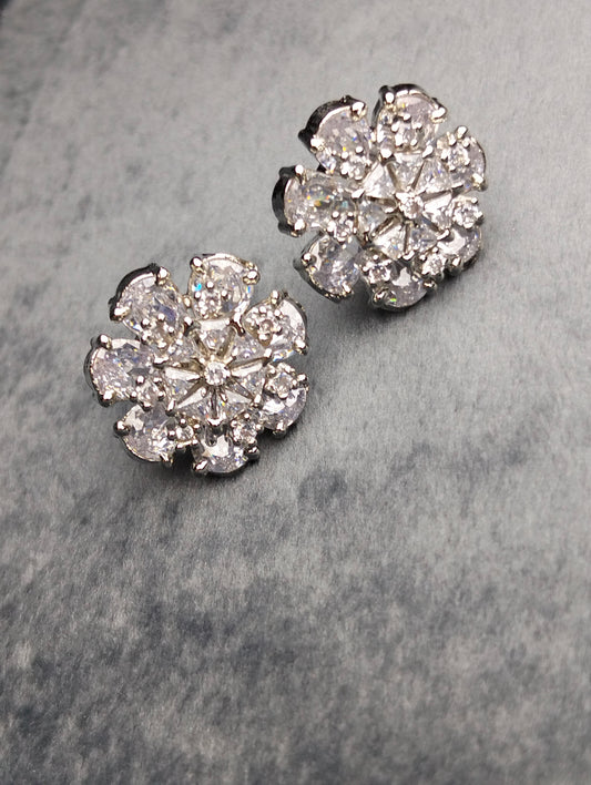 Silver stud in white stone