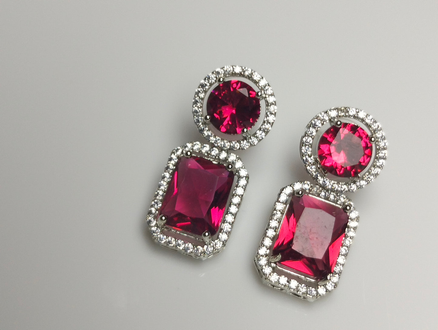 Elegant Red Gemstone & CZ Halo Earrings in Rhodium Plated Silver