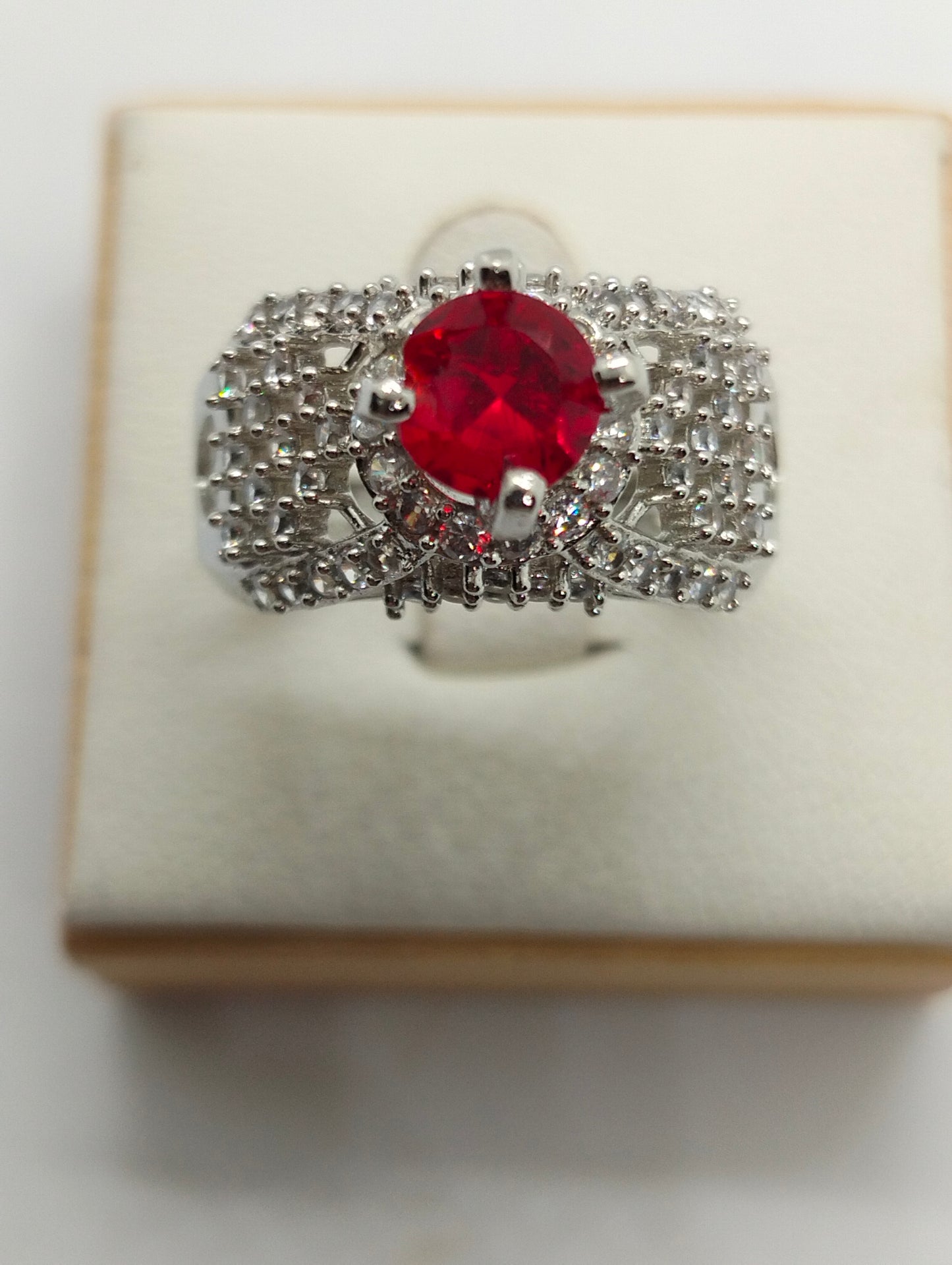 Silver rhodium plated ring in red stone